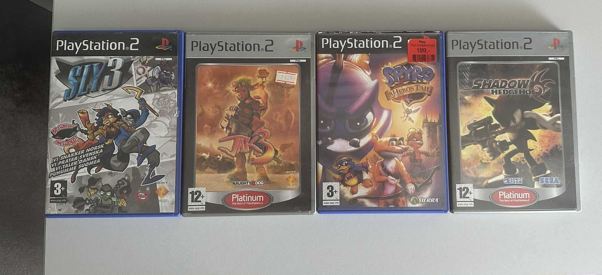 PlayStation 2 Slim + 2 pady + PS2 to HDMI + 4 gry