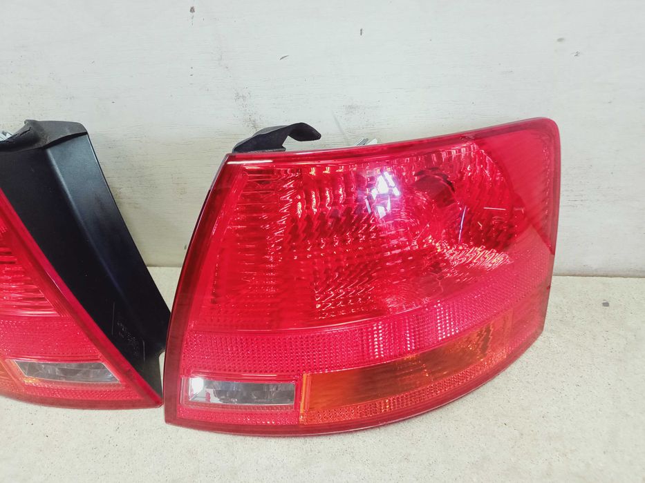 Audi A4 B7 kombi lampa tył tylna prawa lewa oryginał wkład