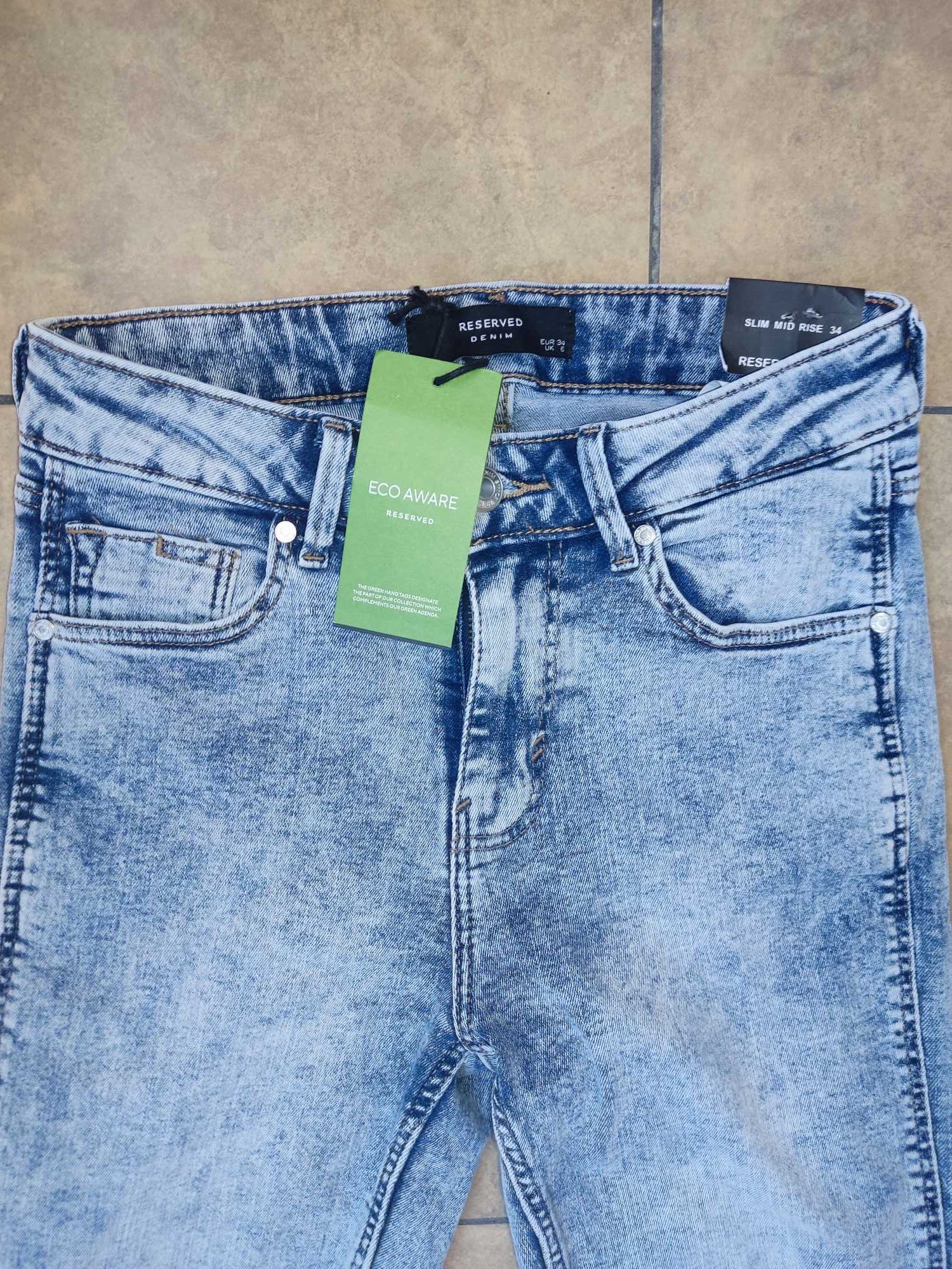 Nove spodnie jeansowe rozmiar 34/XS