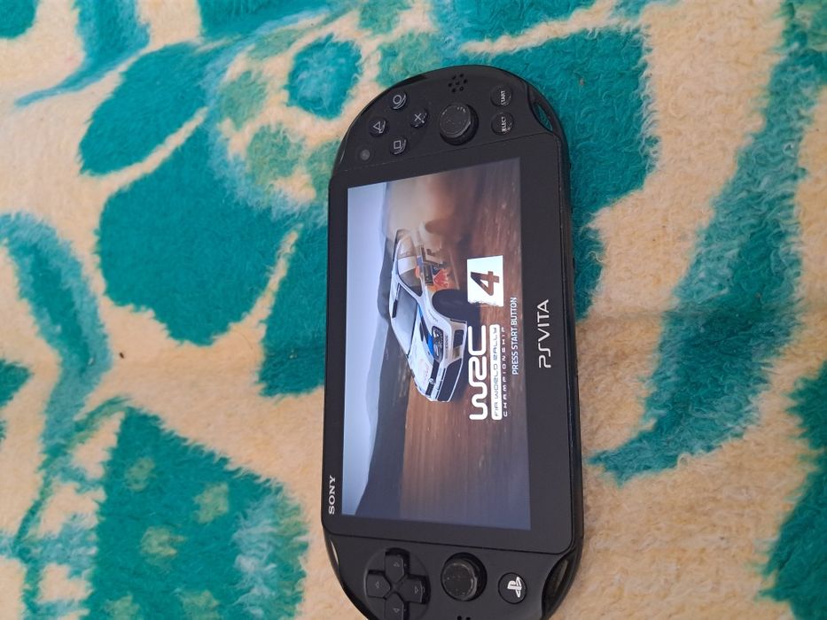 Ps vita slim com jogo
