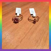 Conjunto de 2 anéis ajustáveis, prateado e rosa. 3 eur o conjunto