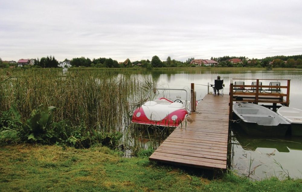 Domek na Mazurach na strzeżonym ośrodku wczasowym z plażą