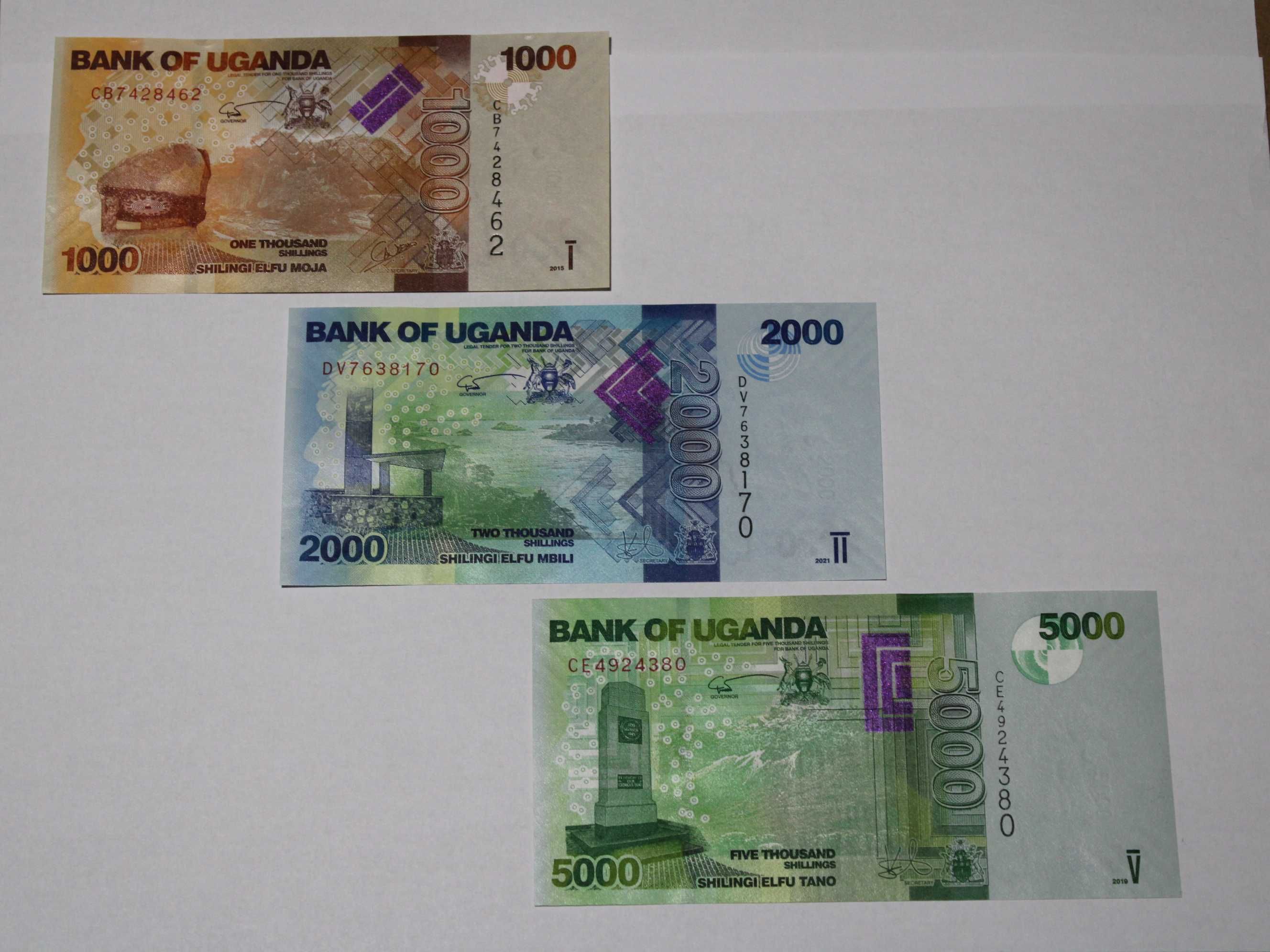 Banknoty Uganda 3 szt. 1000, 2000, 5000 szylingów, stan bankowy UNC.
