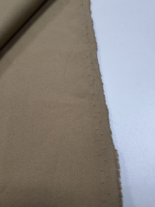 Tkanina cieńsza ciemny beż szer.152 cm.