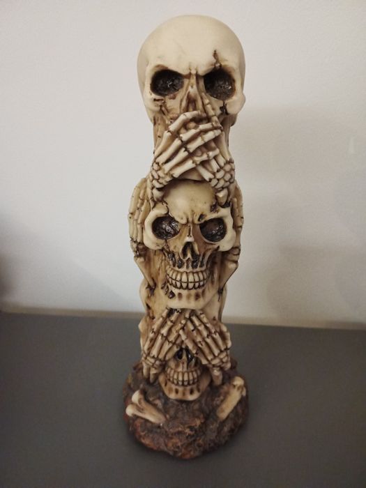 Peça decorativa caveiras