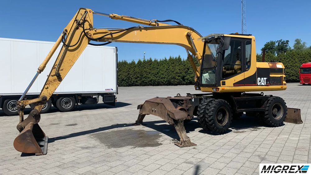 Caterpillar M312  dwudrożna / 1997