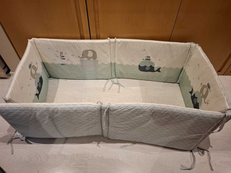 Resguardo de cama de bebé. Como novo. Dentro do saco original