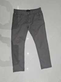 Szare spodnie jeansy c&a W34L32