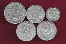 LOTE  5   Moedas   Suissa e Holanda Datas e Valores diferentes  Prata
