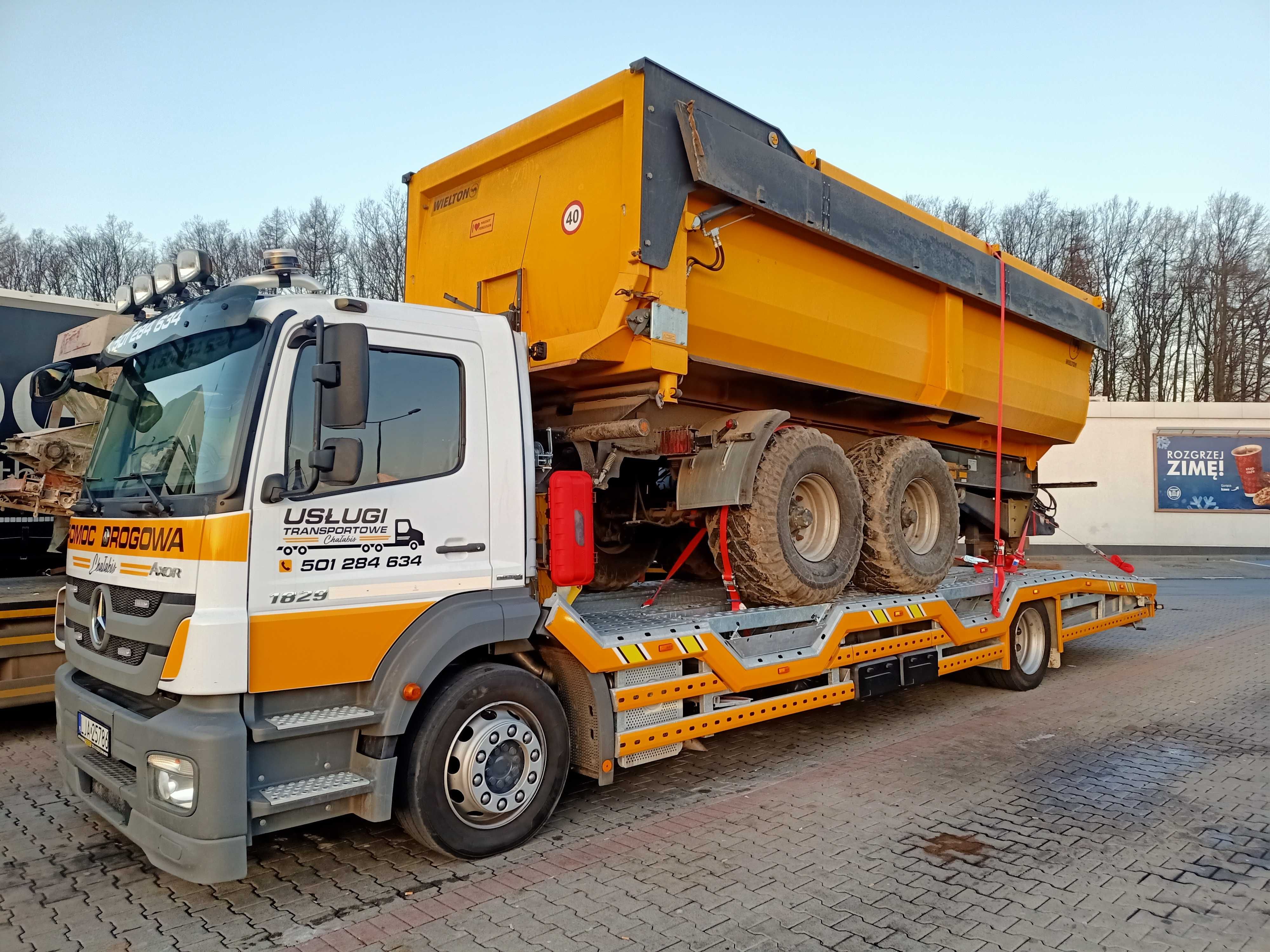 Pomoc drogowa transport maszyn laweta autolaweta usługi transportowe