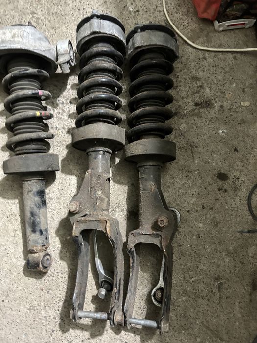 Стійка амортизатор пружина touareg 7p nf fl перед ліва права стойка