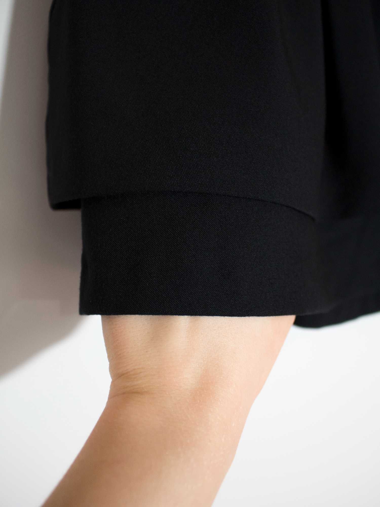 Czarna spódnica z kieszeniami plisy H&M S 36