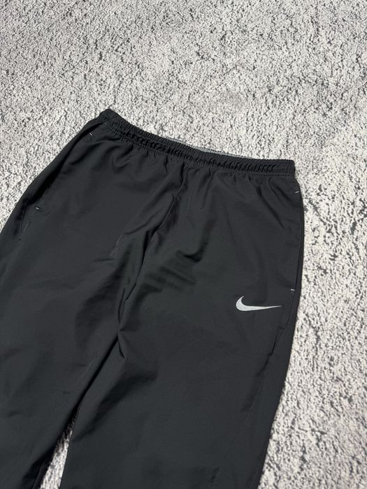 Широкие штаны Nike на утяжках Л размер