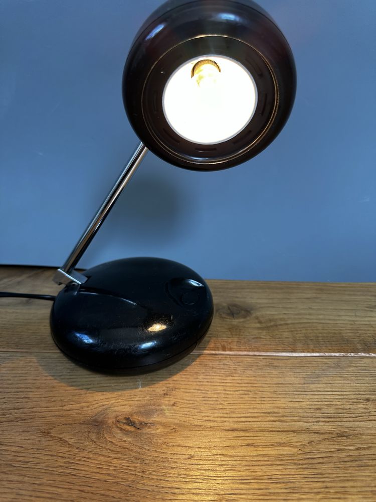 Czarna plastikowa lampka biurkowa regulowana Vintage
