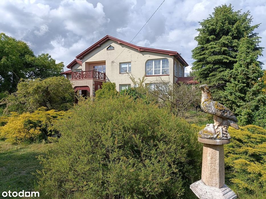 Dom z budynkami gospodarczymi na działce 1 ha