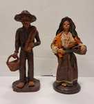 Par de figuras em barro