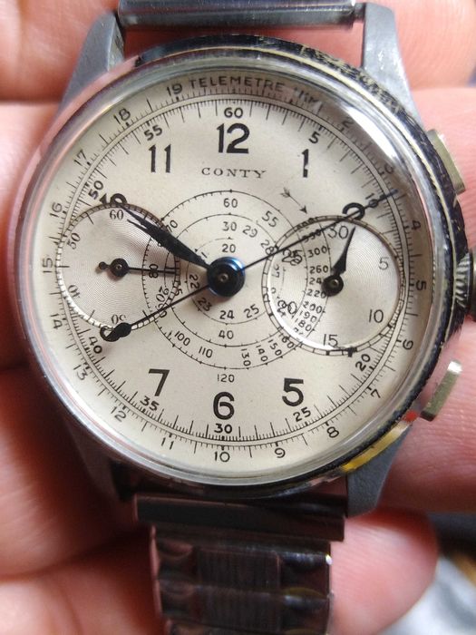 Raro cronógrafo CONTY flyback 34mm corda manual