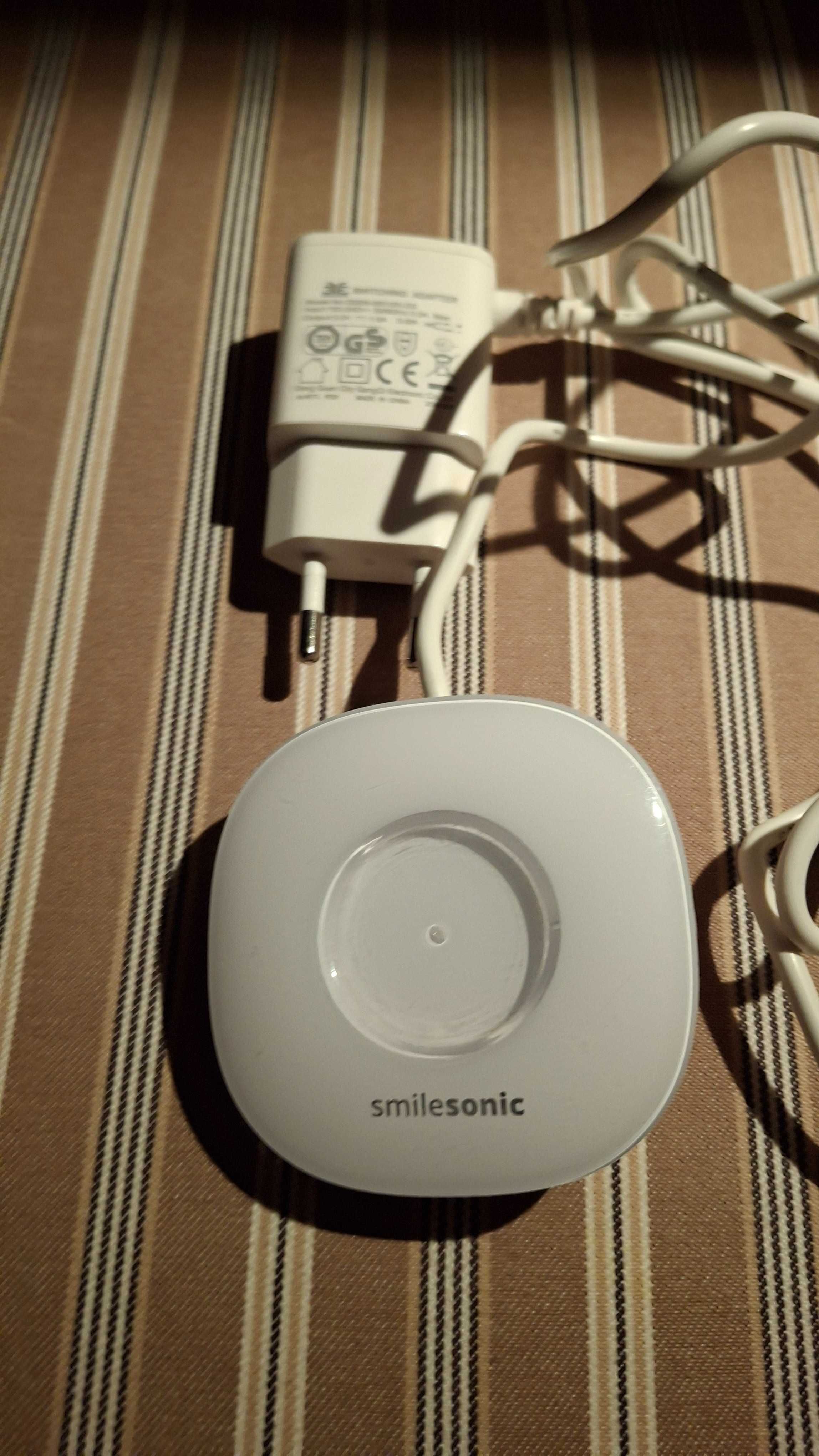 Ładowarka do szczoteczki Smilesonic UP, biała, w pełni sprawna