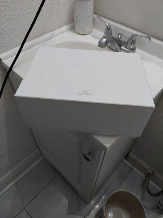 Relógio Omega Seamaster 300 bicolor preto e dourado