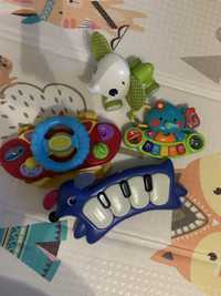 Іграшки для найменших піаніно Skip Hop, кермо, слоник Tiny Love