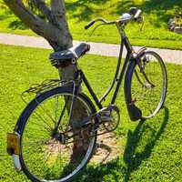 Bicicleta pastelaria de mulher antiga