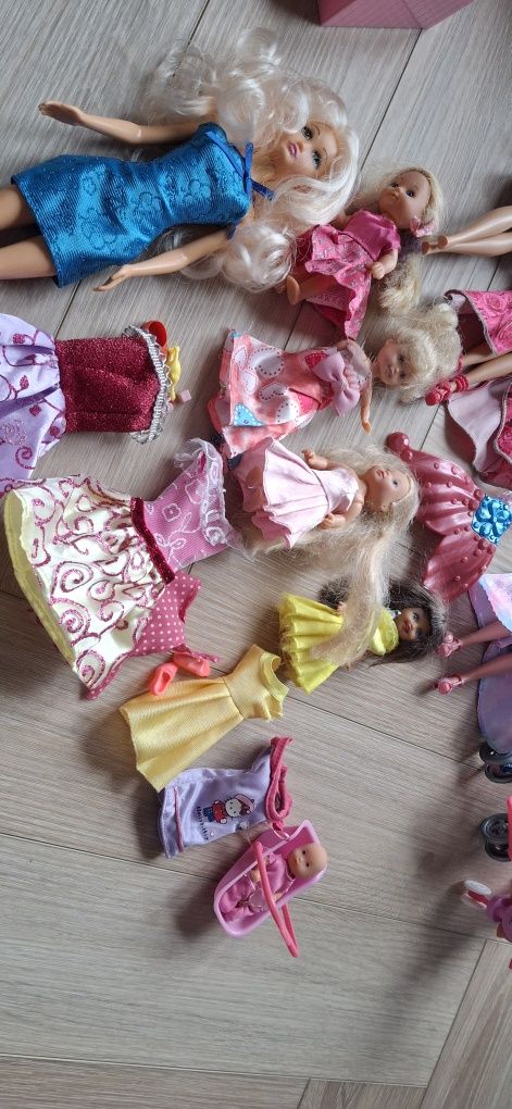 Zestaw lalek Barbi i dzieci; Steffi, wózek,rowerek, nosidełko,ubranka