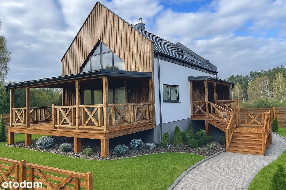 Nowoczesny dom z antresolą i garażem w otoczeniu lasu i jezior