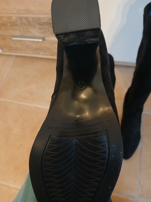 Botas cano alto novas