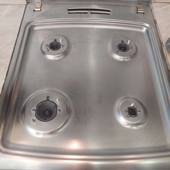 Продам комбинированную газовую печь Hansa с полным газ.контролем.