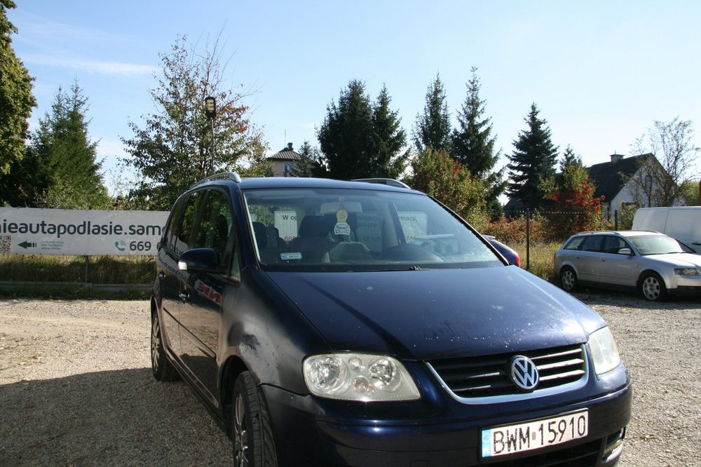 Volkswagen Touran 2.0 TDI na aluskach długie opłaty