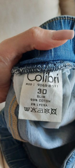 Джинсы женские,состояние новых