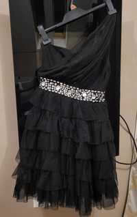 Czarna brokatowa sukienka z falbanami na jedno ramię