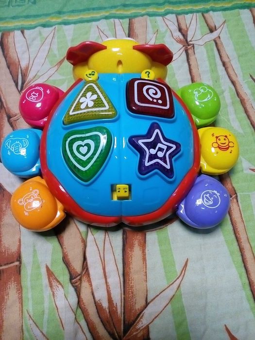 обучающая музыкальная игрушка Божья коровка (20x20 см)