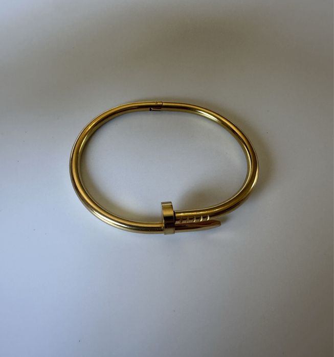 Cartier prego dourada