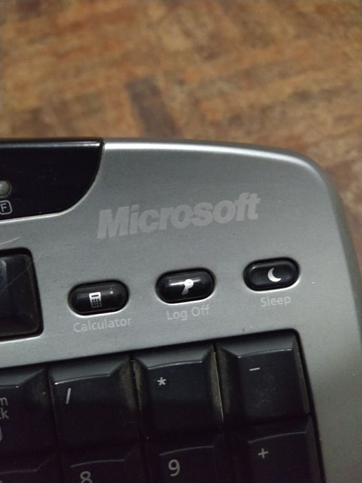 Teclado Microsoft com leitor biométrico layout US