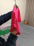 Blusa rosa com folhos