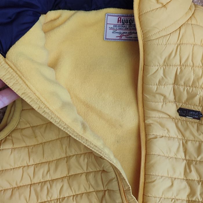 Утеплена жилетка на ріст 110