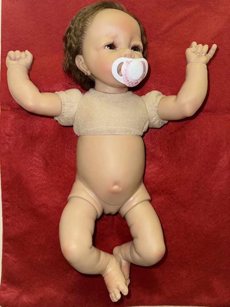 Bebé reborn com corpinho vinil e pano