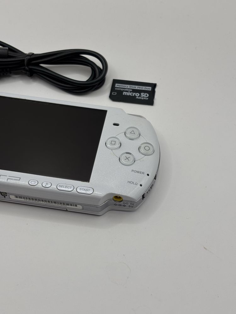 biała konsola PSP 3000 slim + adapter + kabel stan bardzo dobry