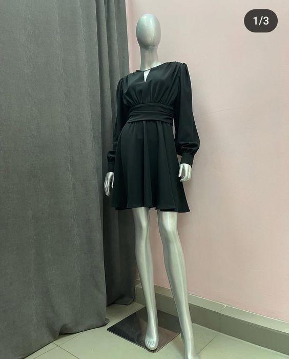 Чорна елегантна сукня українського бренду fayna з пишними рукавами