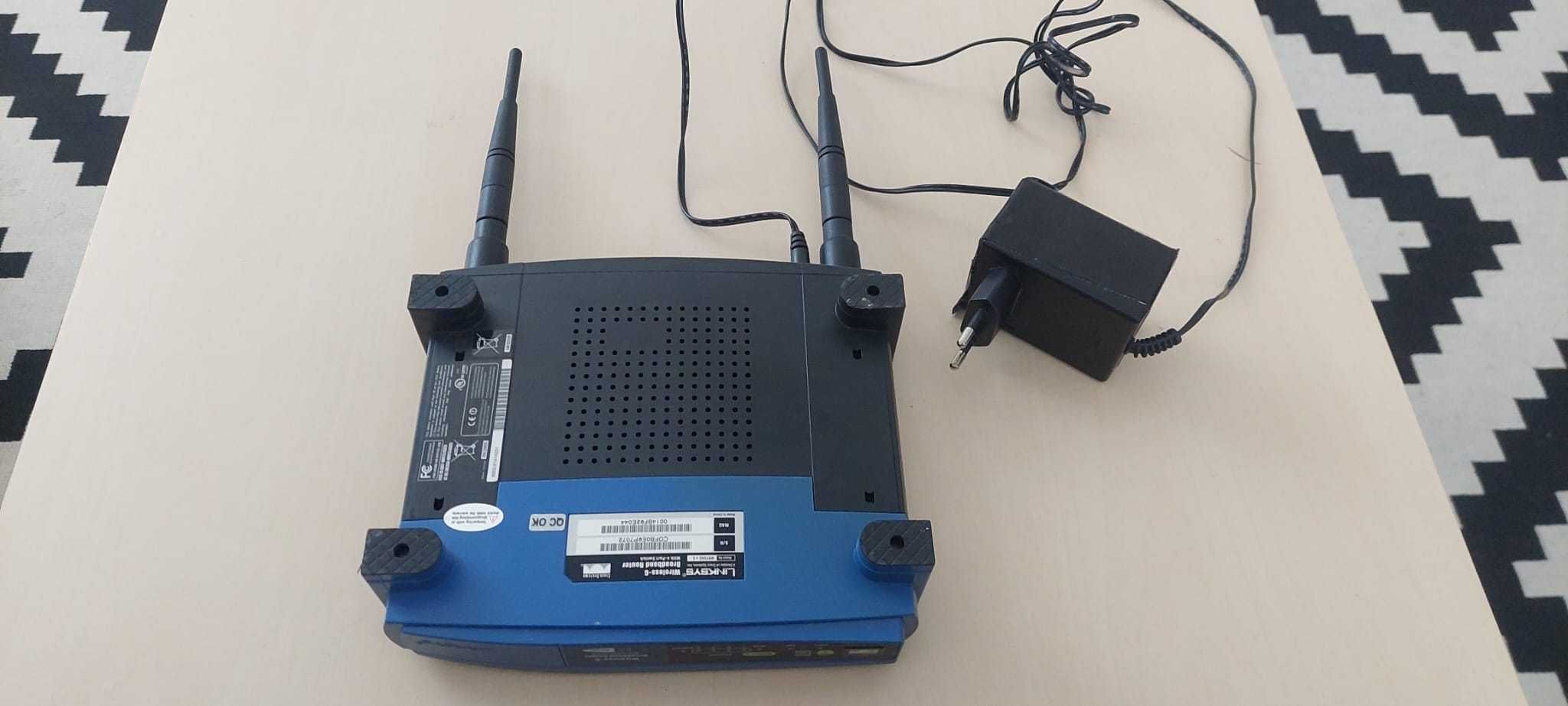 Udany model Router Linksys WRT54G v5 z anteną i zasilaczem