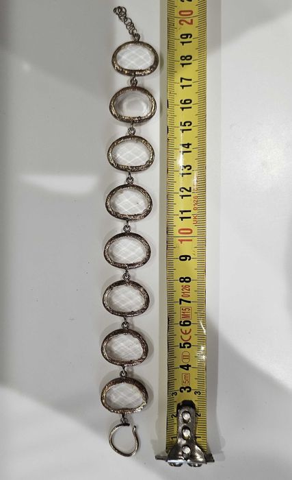 Pulseira prata dourada e pedras