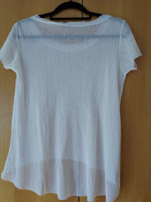 Várias camisolas em malha