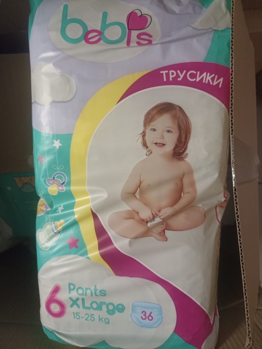 Продам трусики и подгузники Бебис
