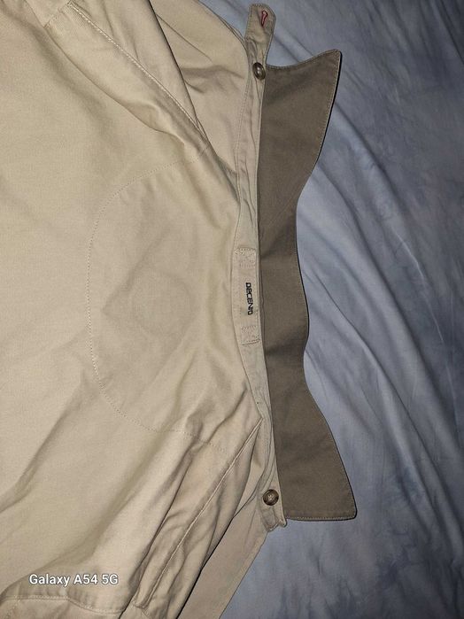 Casaco decenio como novo