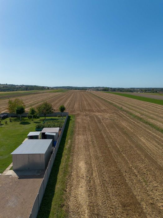 SPRZEDAM działkę budowlaną 20 ar + 1.5 h pole orne Wężerów