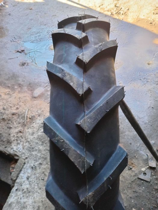 Шини до трактора 8.3-20