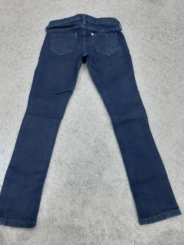 Spodnie dziewczęce firmy Denim w rozmiarze 110cm