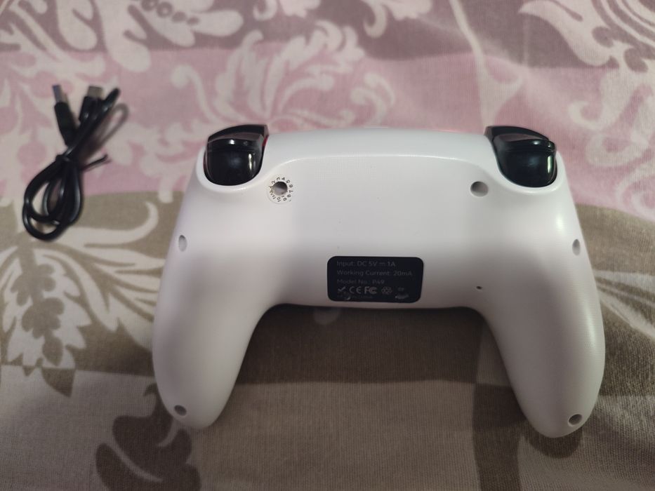 Срочно продам Безпровідний два ігрових джойстика BORN P49  для PS4,