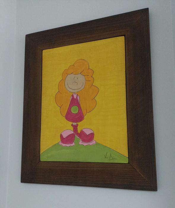 Quadros infantis  manufaturados em barro com molduras em madeira.